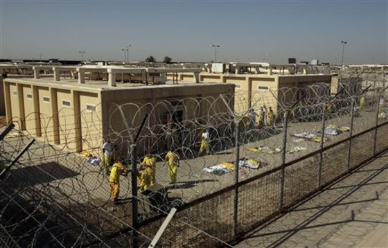 Detainees are seen outside their cell block at the U.S. detention facility at Camp Cropper in Baghdad, Iraq. 